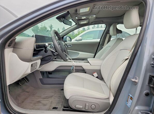 KMHM54AC0RA058812 2024 HYUNDAI IONIQ Серый Вид салона спереди