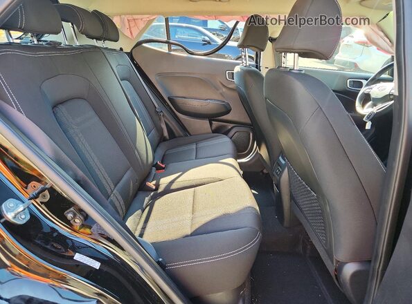 KMHRC8A35RU291571 2024 HYUNDAI VENUE Black Vista interior trasera