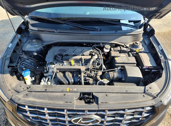 KMHRC8A35RU291571 2024 HYUNDAI VENUE Black Vista del compartimento del motor