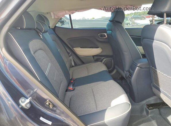 KMHRC8A37SU365997 2025 HYUNDAI VENUE Blue Rear interior view