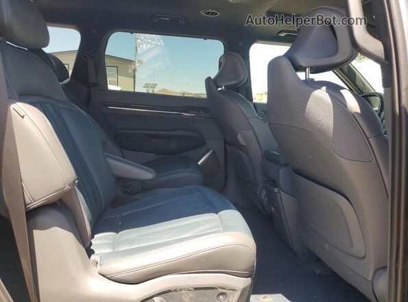 KNDAEFS51R6026280 2024 KIA EV9 Gray Vista de los asientos traseros