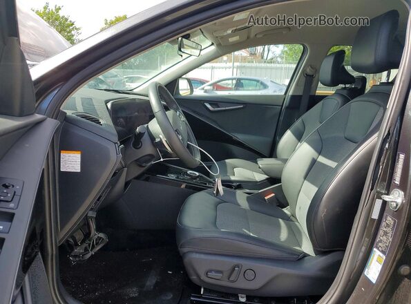 KNDCR3L10P5021873 2023 KIA NIRO Charcoal Front interior view