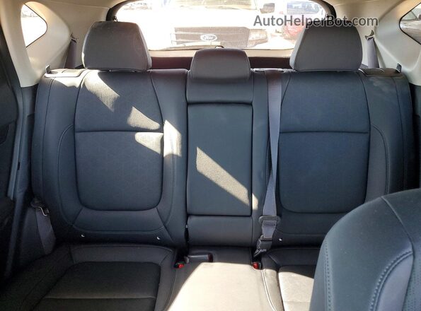 KNDER2AA8R7564711 2024 KIA SELTOS Gray Rear seats view
