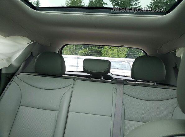 KNDJX3AE4G7017283 2016 KIA SOUL Black Rear seats view