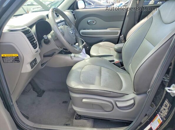 KNDJX3AE7G7013082 2016 KIA SOUL Black Front interior view