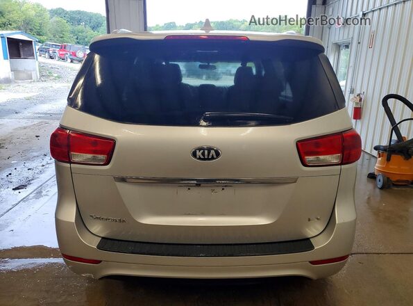 KNDMB5C1XG6103463 2016 KIA SEDONA Серебряный Вид салона спереди