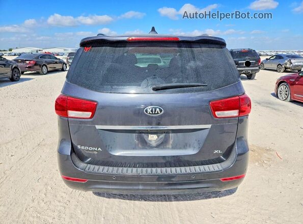 KNDMB5C1XH6281181 2017 KIA SEDONA Gray უკანა ხედი