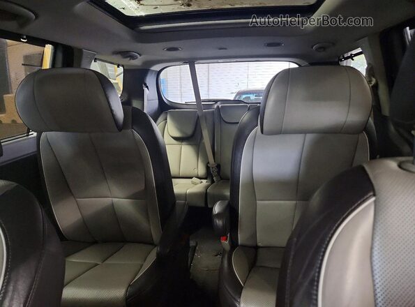 KNDME5C17H6278973 2017 KIA SEDONA Black უკანა სავარძლების ხედი