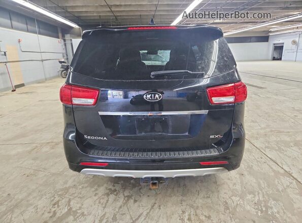 KNDME5C17H6278973 2017 KIA SEDONA Black უკანა ხედი