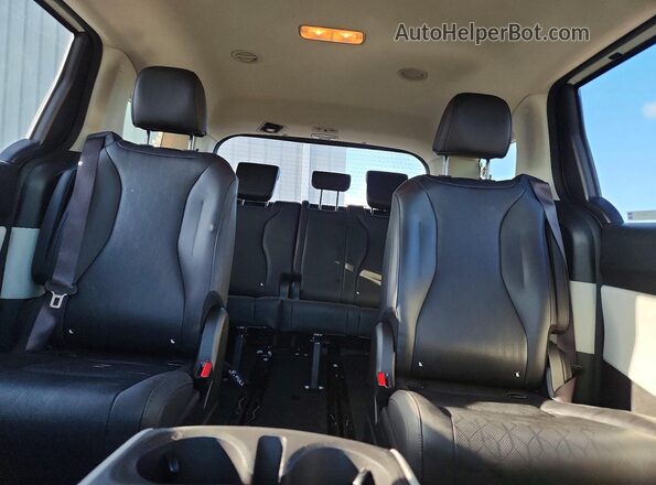 KNDNB4H32R6306858 2024 KIA CARNIVAL White უკანა სავარძლების ხედი