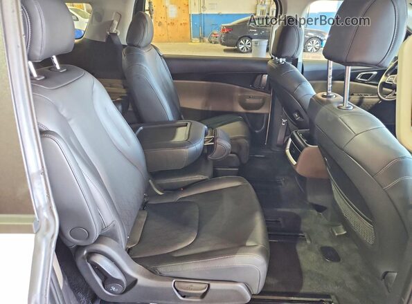 KNDNB5K36T6609082 2026 KIA CARNIVAL Белый Вид задней части салона