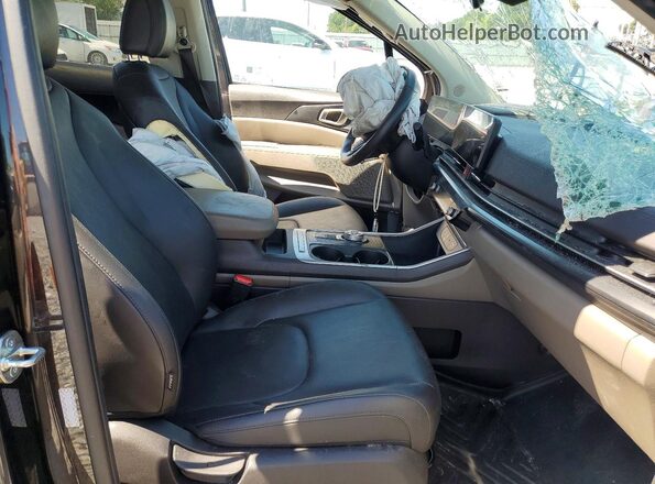 KNDNB5KA1S6044737 2025 KIA CARNIVAL Charcoal Vista interior delantera