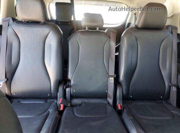 KNDNB5KA1S6044737 2025 KIA CARNIVAL Charcoal Vista de los asientos traseros