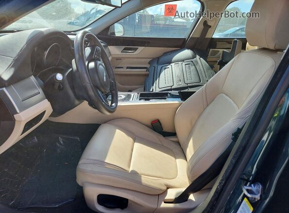 SAJBD4BV6HCY32354 2017 JAGUAR XF Green Front interior view