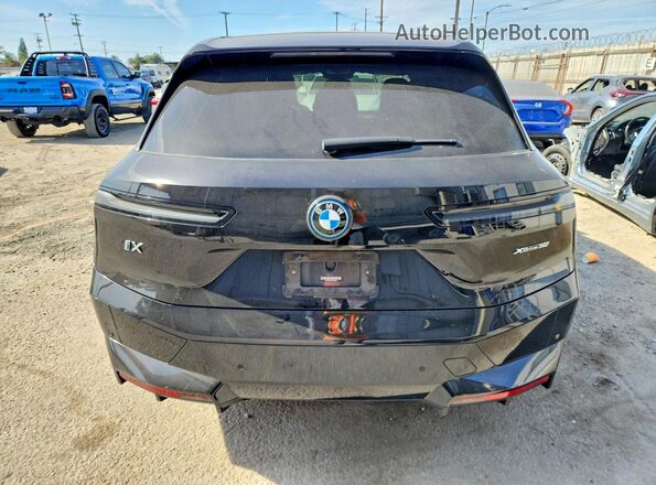 WB523CF03PCL61722 2023 BMW IX Black Հետևի տեսք