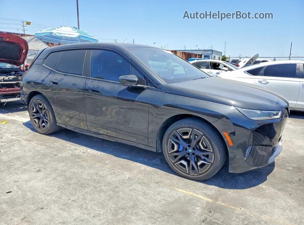 WB523CF03RCN40748 2024 BMW IX Black Առջևի աջ
