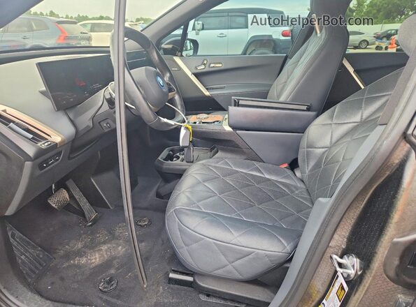 WB523CF06PCM65749 2023 BMW IX Черный Вид салона спереди
