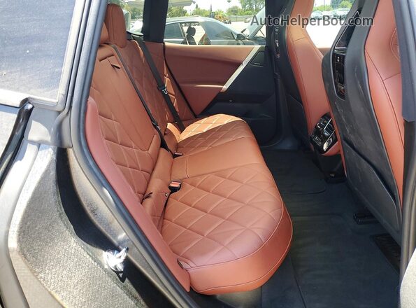 WB523CF09SCS36233 2025 BMW IX Черный Вид задней части салона