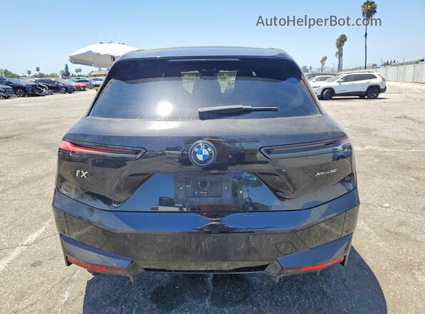 WB523CF09SCS36233 2025 BMW IX Черный Вид сзади