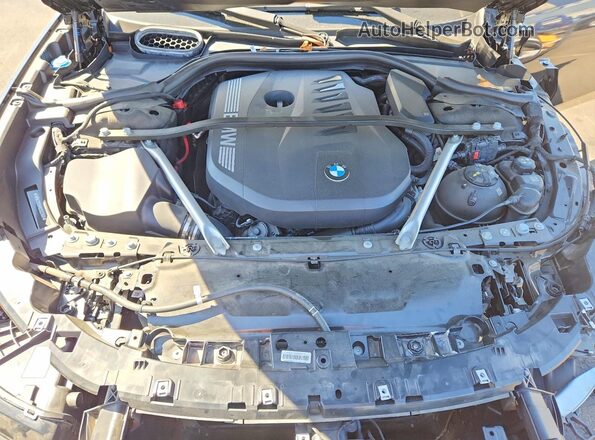 WBA23EH01RCR02909 2024 BMW 7 SERIES Black Vista interior trasera