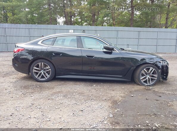 WBA33FB03TFW81225 2026 BMW 4 SERIES Black Vista interior trasera