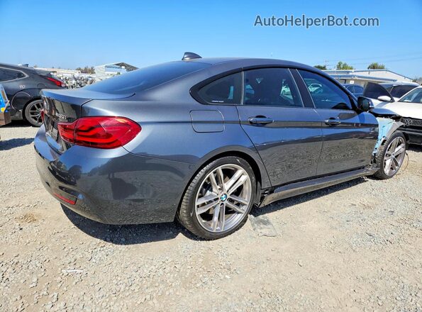 WBA4J1C50KBM12712 2019 BMW 4 SERIES Gray Trasero derecho