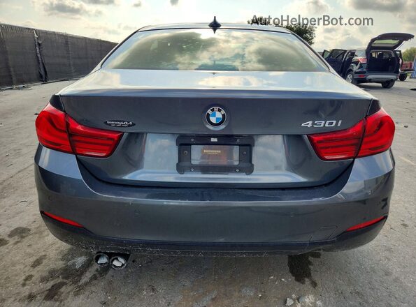 WBA4W3C53KAF92306 2019 BMW 4 SERIES Gray Rear view