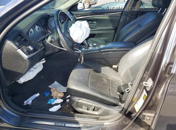WBA5A5C55GD527670 2016 BMW 5 SERIES Charcoal Front interior view