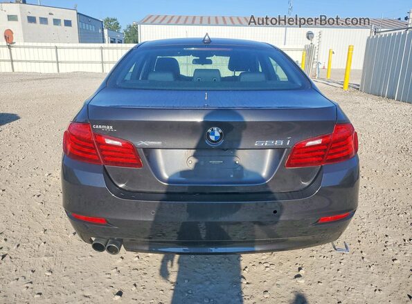 WBA5A7C54GG642173 2016 BMW 5 SERIES Charcoal Rear view