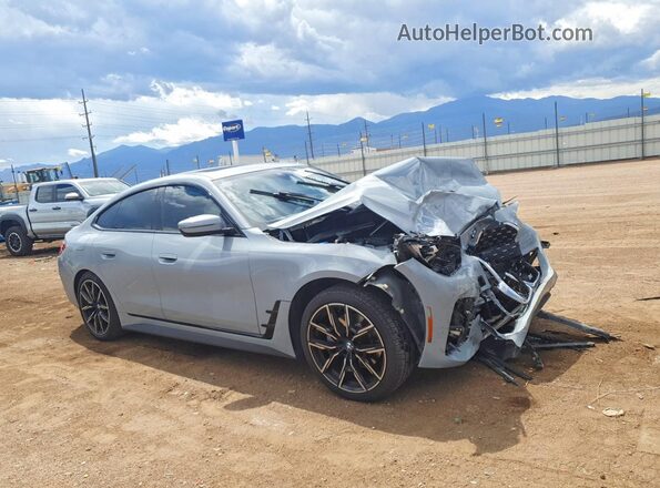 WBA73AV08PFP23975 2023 BMW 4 SERIES Серый Передняя правая четверть