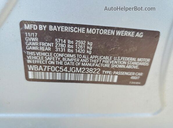 WBA7F0C54JGM23822 2018 BMW 7 SERIES White Vista del compartimento del motor