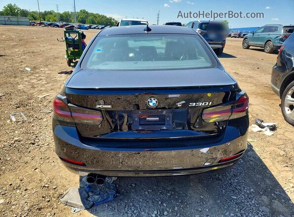 WBA8D9G50JNU69376 2018 BMW 3 SERIES Black Rear view