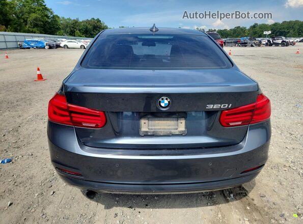 WBA8E1G52GNT35525 2016 BMW 3 SERIES Gray Widok z tyłu