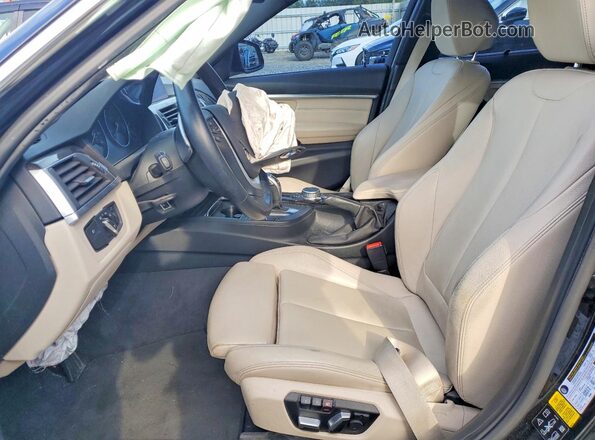 WBA8E3C58GK500559 2016 BMW 3 SERIES Black Front interior view
