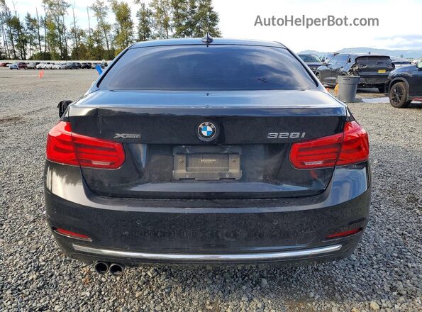 WBA8E3C58GK500559 2016 BMW 3 SERIES Black Rear view
