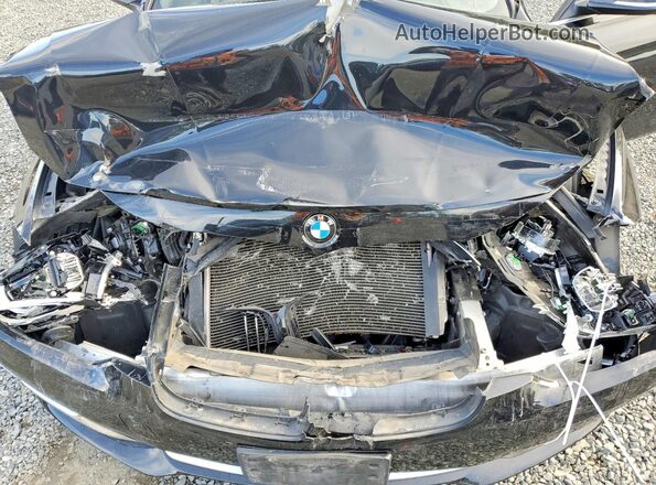 WBA8E3C58GK500559 2016 BMW 3 SERIES Black Rear interior view