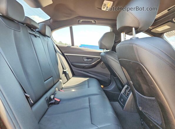 WBA8E9G59GNT46620 2016 BMW 3 SERIES Black Vista de los asientos traseros