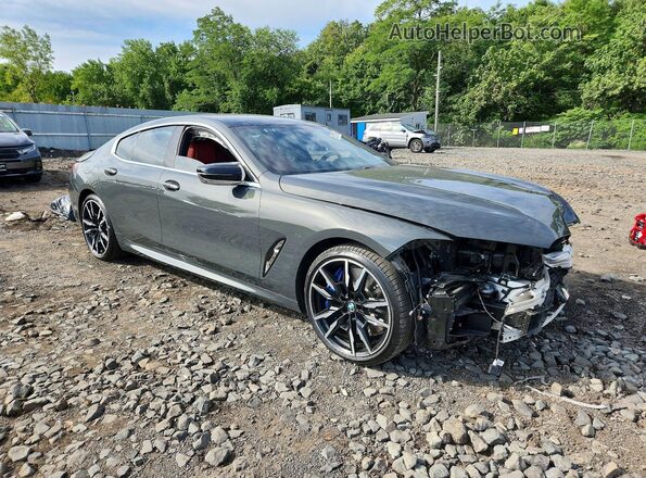 WBAGV8C00RCN84970 2024 BMW M8 Серый Передняя правая четверть