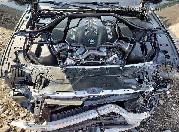 WBAGV8C00RCN84970 2024 BMW M8 Серый Вид задней части салона