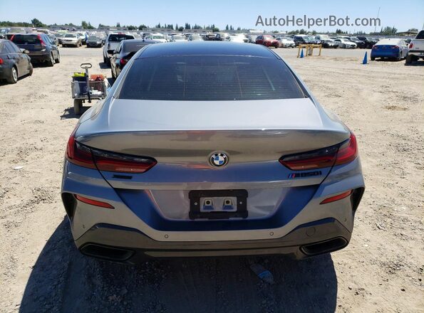 WBAGV8C05SCU70677 2025 BMW M8 Gray Widok z tyłu