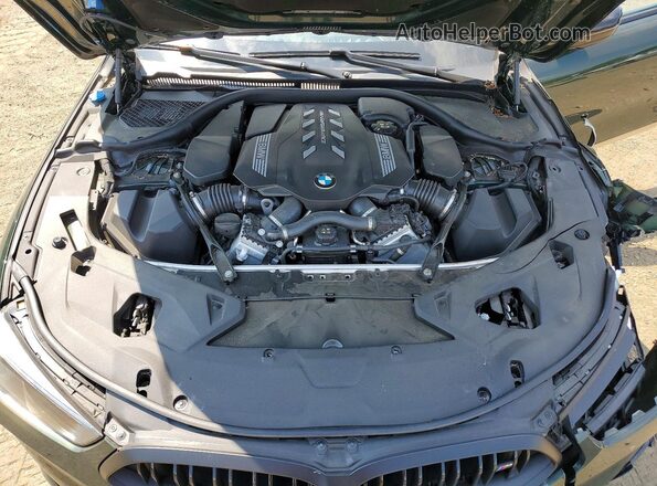 WBAGV8C08RCP29222 2024 BMW M8 Green Вид задньої частини салону