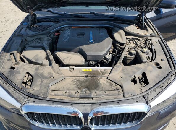 WBAJA9C53JG622854 2018 BMW 5 SERIES Black Rear interior view