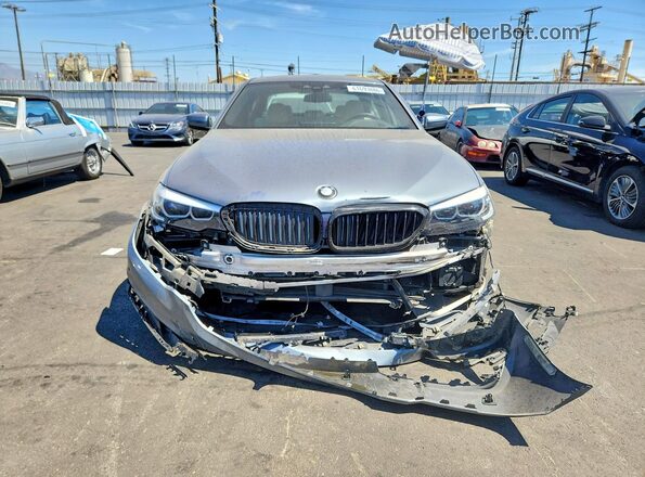 WBAJA9C57JG622906 2018 BMW 5 SERIES Gray Front view