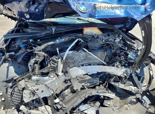 WBX73EF06P5V94510 2023 BMW X1 Blue Vista del compartimento del motor