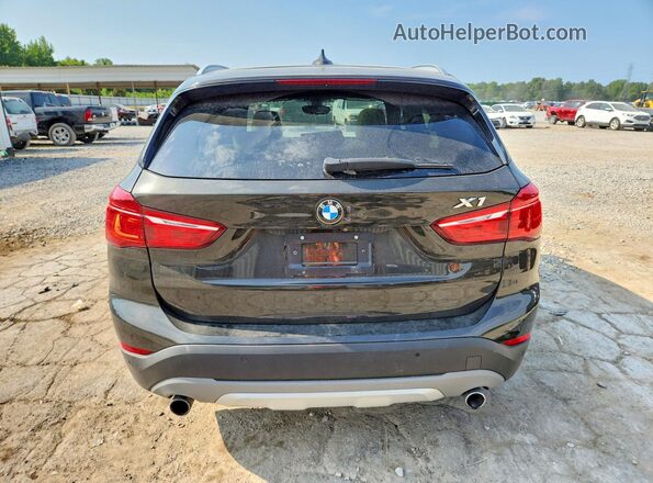 WBXHT3C31G5F64115 2016 BMW X1 Черный Вид сзади