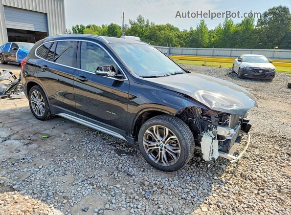 WBXHT3C31G5F64115 2016 BMW X1 Черный Передняя правая четверть