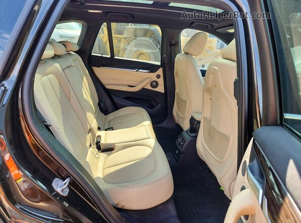 WBXHT3C31G5F64115 2016 BMW X1 Черный Вид задних сидений