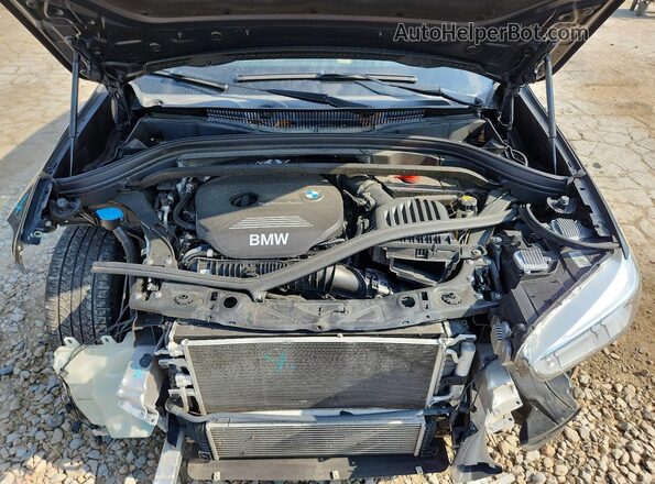 WBXHT3C31G5F64115 2016 BMW X1 Черный Вид задней части салона