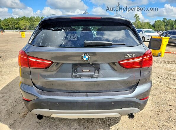 WBXHT3C31GP880843 2016 BMW X1 Gray Вид ззаду