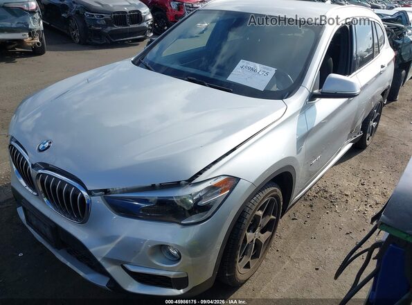 WBXHT3C33G5F65699 2016 BMW X1 Silver Front left